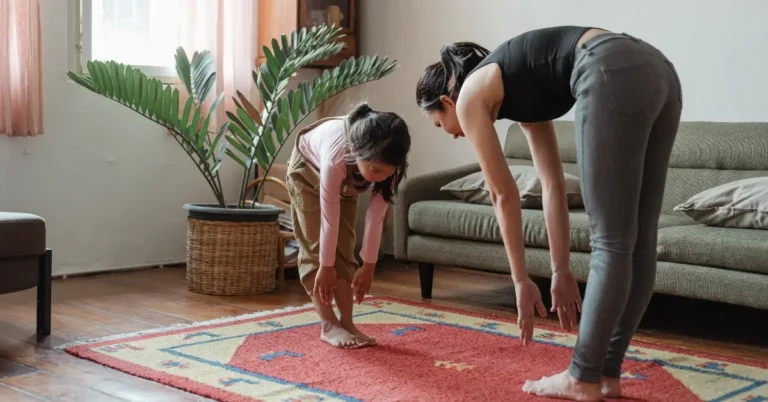 morning exercise for kids + A mom and her child are stretching together.