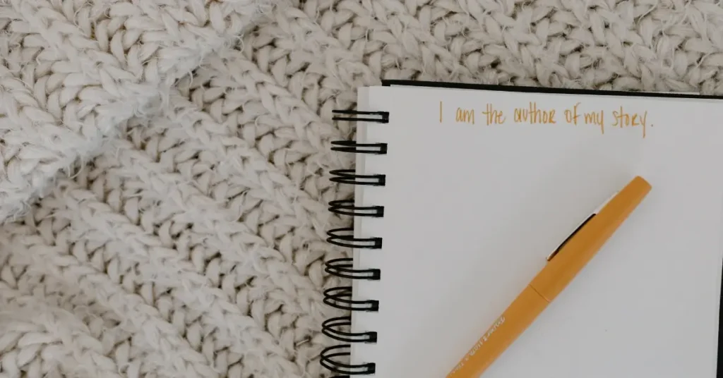how to write affirmations + A journal for writing affirmations lies on the table